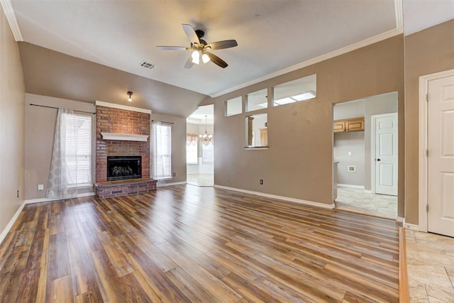 unfurnished living room with ceiling fan, light wood finished floors, visible vents, and baseboards