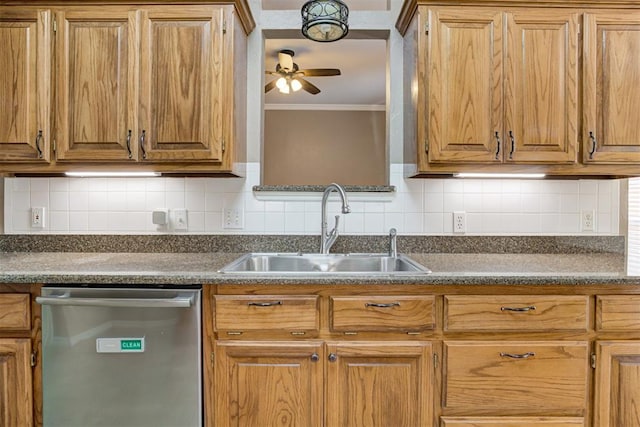 kitchen with crown molding, backsplash, a ceiling fan, a sink, and dishwasher