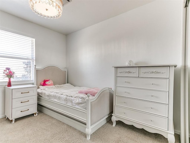 bedroom featuring visible vents