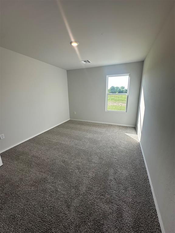 43068 Wagon Trl, Shawnee, OK 74804 - spare room with carpet and baseboards