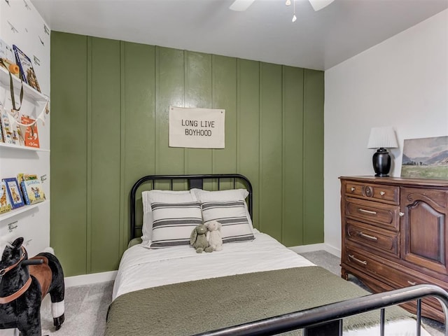 carpeted bedroom with a ceiling fan