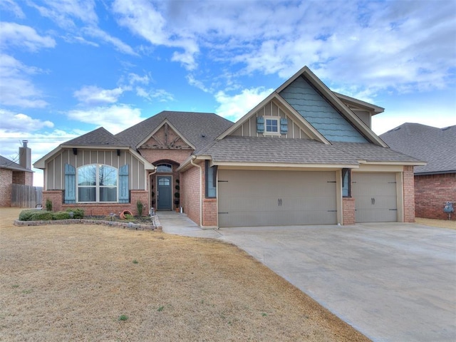 craftsman-style house featuring a garage, concrete driveway, brick siding, and a shingled roof