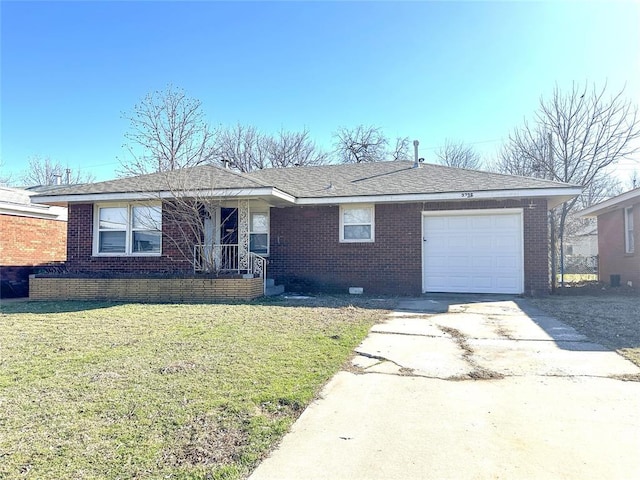 single story home featuring a garage, a shingled roof, brick siding, driveway, and a front lawn