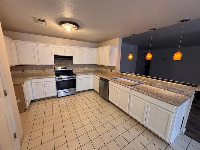 kitchen with visible vents, backsplash, appliances with stainless steel finishes, a peninsula, and under cabinet range hood