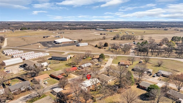 birds eye view of property with a rural view