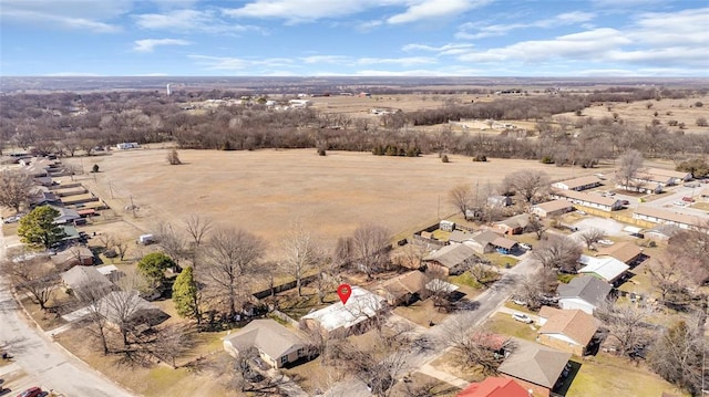 birds eye view of property featuring a rural view