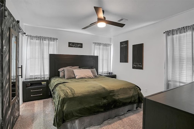 bedroom featuring carpet flooring and a ceiling fan