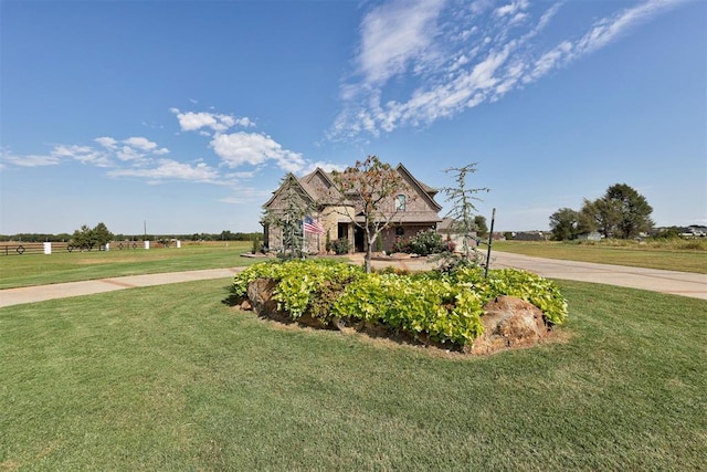 view of front of property with a front lawn