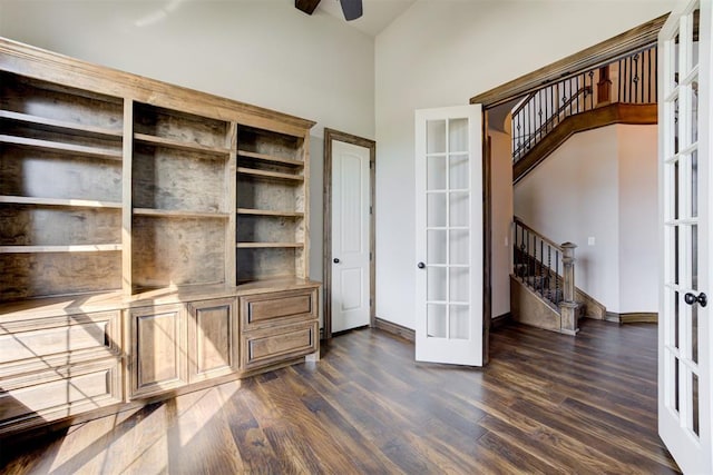 office area with ceiling fan, baseboards, dark wood-type flooring, and french doors