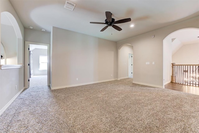 unfurnished room featuring carpet, visible vents, baseboards, and recessed lighting