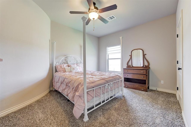 bedroom with baseboards, visible vents, ceiling fan, and carpet flooring