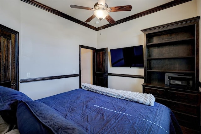 bedroom with ceiling fan and ornamental molding