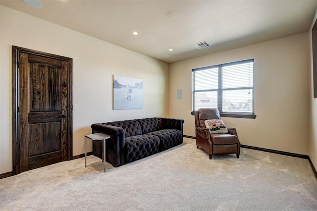 living area featuring visible vents, recessed lighting, baseboards, and carpet floors