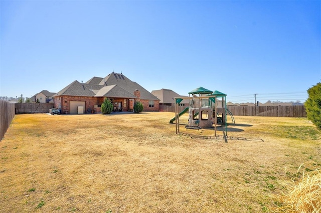 view of play area featuring a fenced backyard