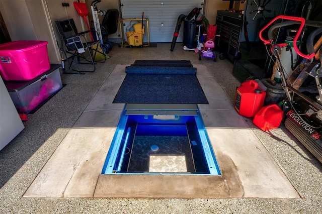 entry to storm shelter featuring a garage