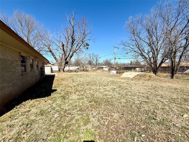 view of yard featuring fence