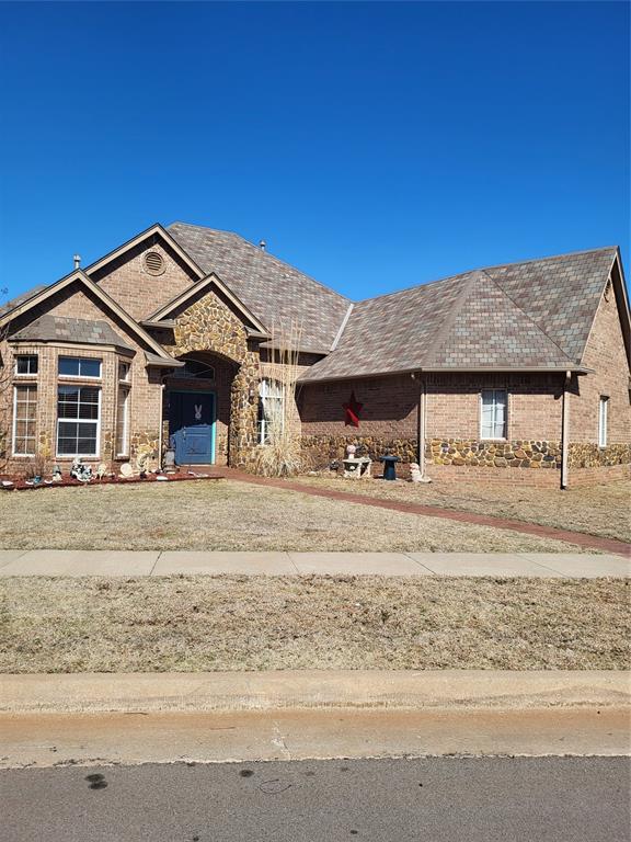 view of front of property with brick siding