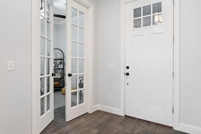 entryway featuring baseboards, dark wood-style floors, and french doors
