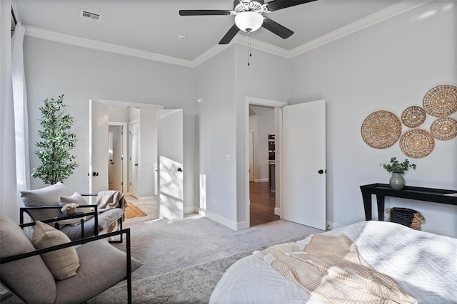 bedroom featuring light carpet, baseboards, visible vents, and crown molding