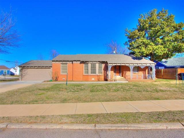 ranch-style home with brick siding, a porch, concrete driveway, fence, and a front lawn