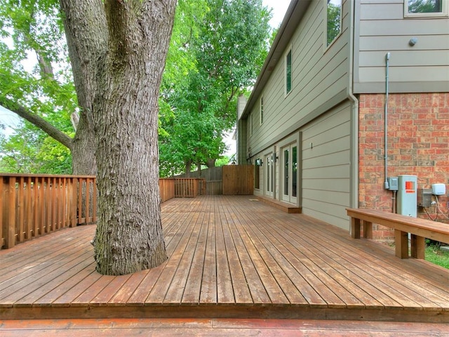 wooden deck featuring french doors