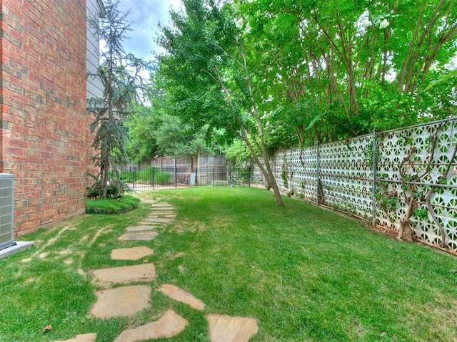 view of yard with a fenced backyard