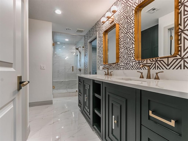 bathroom with a marble finish shower, visible vents, and marble finish floor