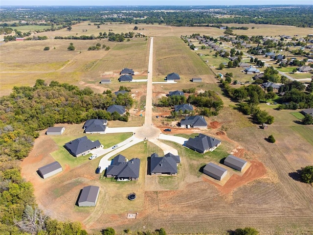 birds eye view of property with a residential view and a rural view