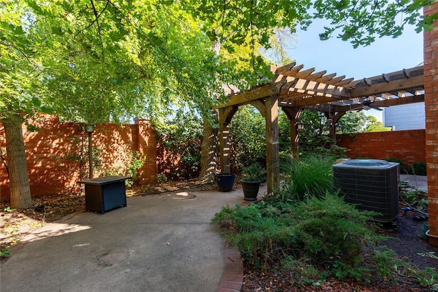 view of patio / terrace featuring a fenced backyard, a pergola, and cooling unit