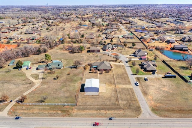 birds eye view of property with a residential view