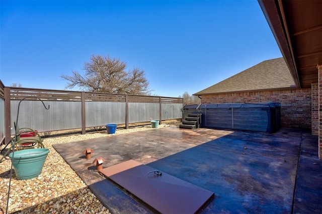 view of patio with a fenced backyard