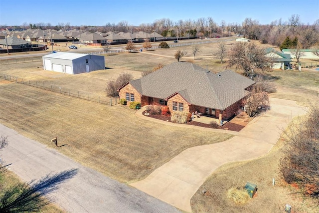 birds eye view of property with a residential view