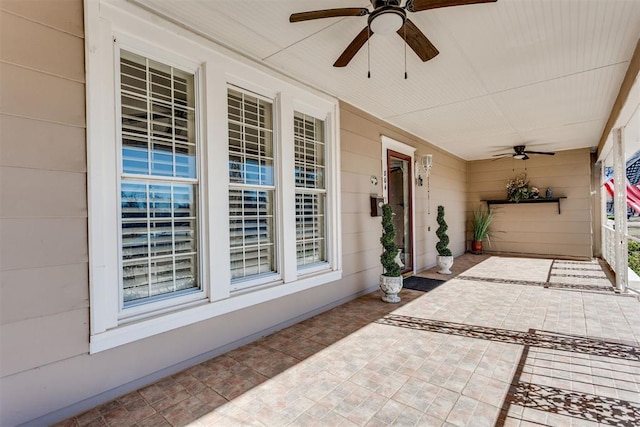 view of patio featuring a ceiling fan