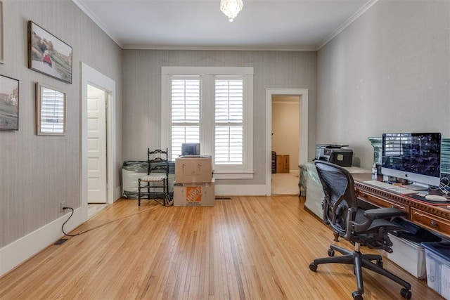 home office with baseboards, crown molding, and wood finished floors