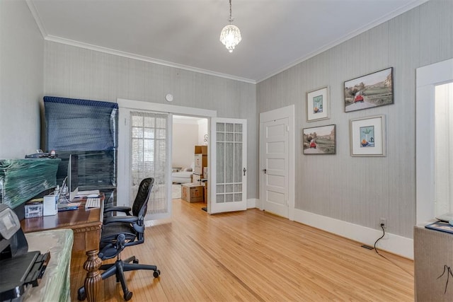 office with french doors, ornamental molding, wood finished floors, and baseboards