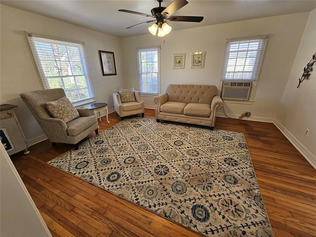 804 N Willow St, Pauls Valley, OK 73075 - living room featuring dark wood finished floors, baseboards, cooling unit, and ceiling fan