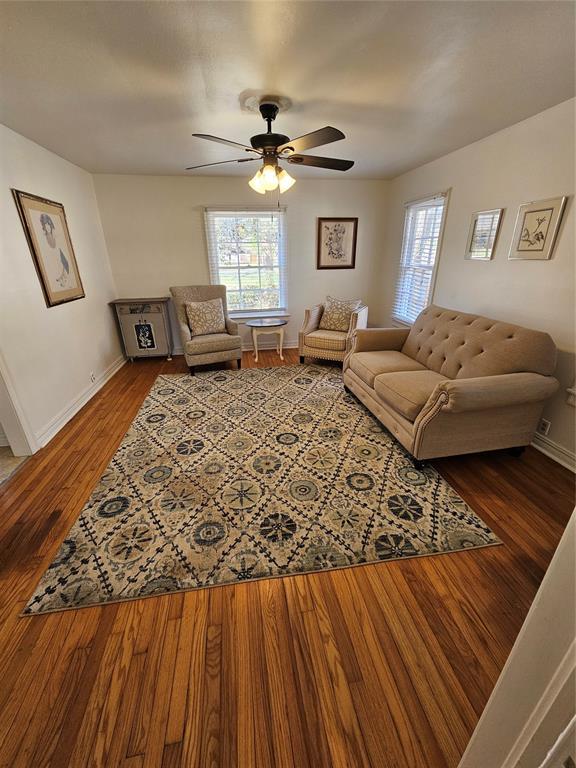 804 N Willow St, Pauls Valley, OK 73075 - living area with baseboards, ceiling fan, and wood finished floors