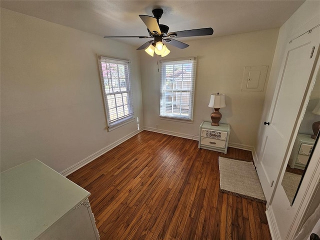 804 N Willow St, Pauls Valley, OK 73075 - unfurnished bedroom with baseboards, wood finished floors, and a ceiling fan