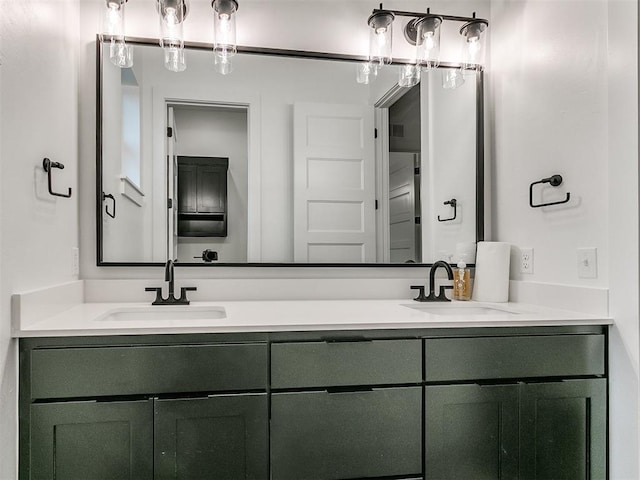 bathroom with double vanity and a sink