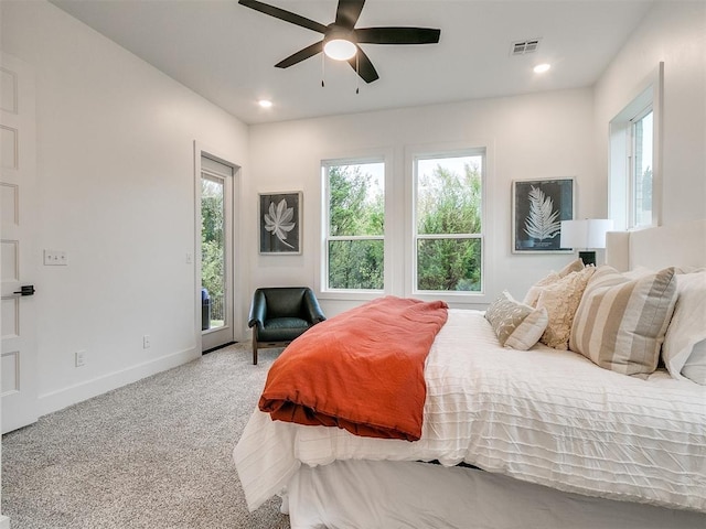 bedroom featuring recessed lighting, carpet floors, visible vents, baseboards, and access to outside