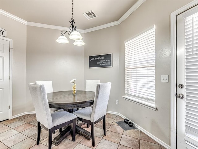 dining area featuring light tile patterned floors, baseboards, visible vents, and ornamental molding