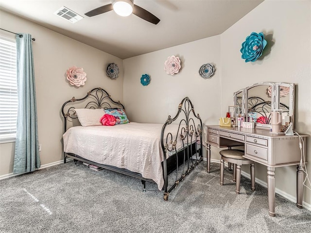 bedroom with carpet floors, multiple windows, and visible vents