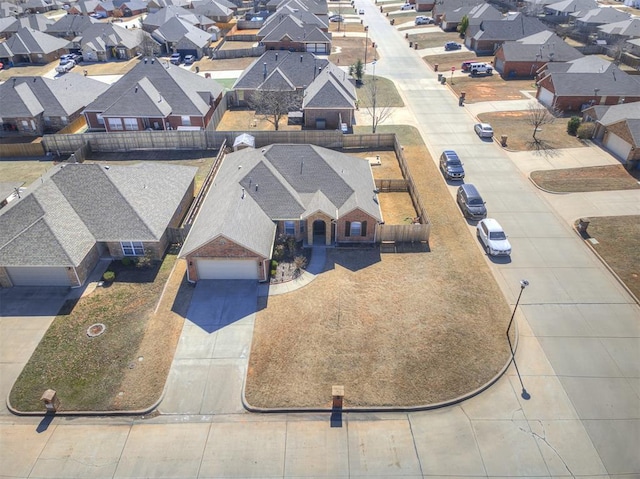 birds eye view of property with a residential view