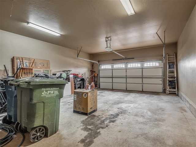 garage featuring a garage door opener