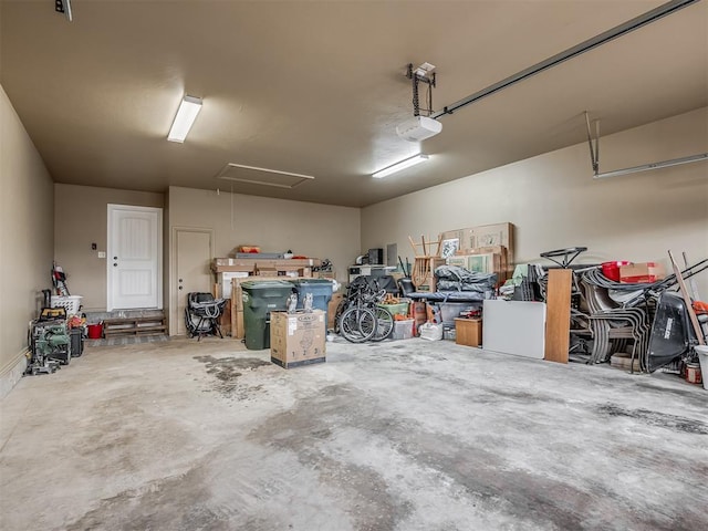 garage featuring a garage door opener