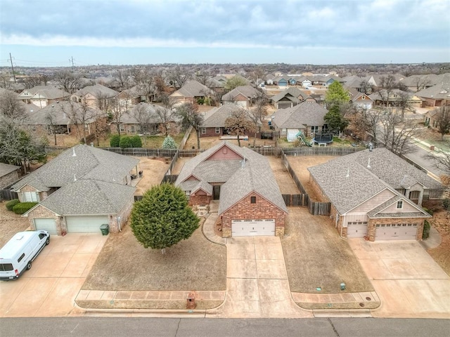 birds eye view of property with a residential view