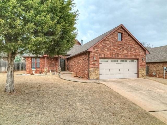 single story home featuring driveway, fence, roof with shingles, an attached garage, and brick siding