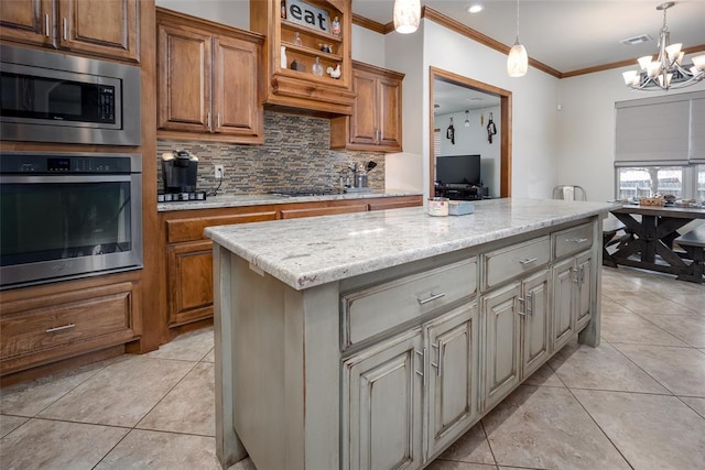 kitchen featuring light tile patterned floors, appliances with stainless steel finishes, backsplash, and visible vents