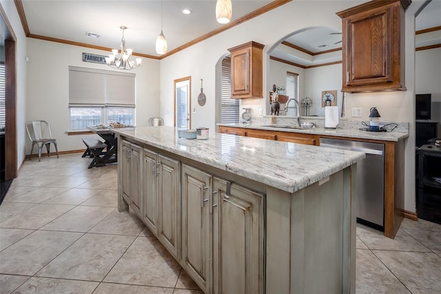 kitchen with light tile patterned floors, a kitchen island, a sink, dishwasher, and crown molding