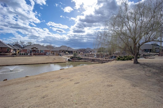 property view of water featuring a residential view